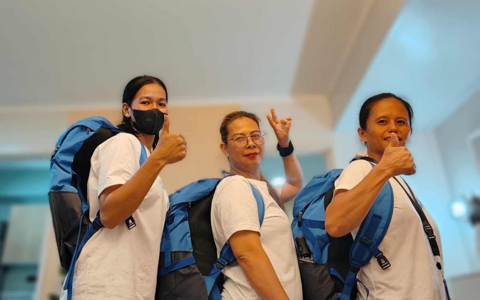 HelpMeet team members in branded uniforms ready for a cleaning job